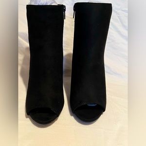 Women’s peep toe booties/heels.